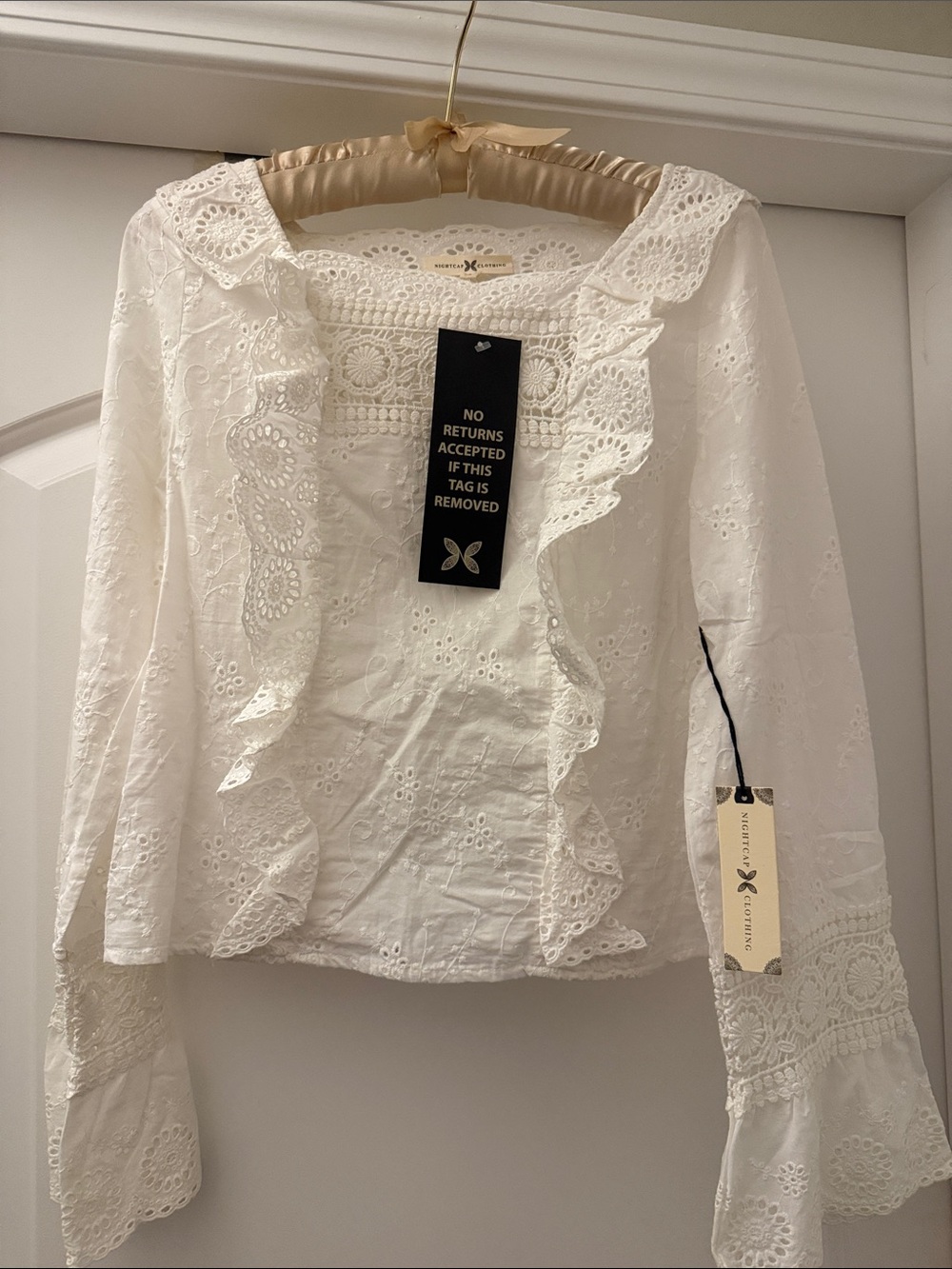 Nightcap Women's White Eyelet Ruffle Blouse